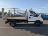 a white truck that is parked in a parking lot