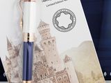 a pen that is sitting on top of a piece of paper