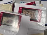 many different types of paper on the table
