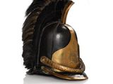 an image of a helmet with a feather on top of it