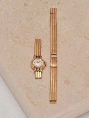 MOVADO Montre de dame en or jaune 18k 750 millièmes à mouvem…