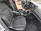 the interior of a car with black leather seats and a steering wheel