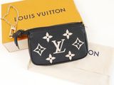 louis vuitton black monograme leather wrist bag with chain