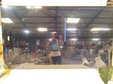 a man taking a picture of himself in a mirror