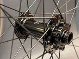 a close up of a bicycle wheel with spokes and spokes