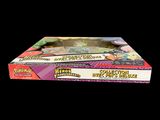 a close up of a box of pokemon trading cards on a black background