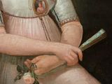 portrait of a woman in a pink dress holding a fan
