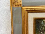 an image of a picture of a painting on a easel in a room