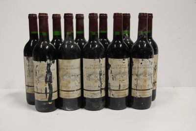 six bottles of wine are lined up in a row
