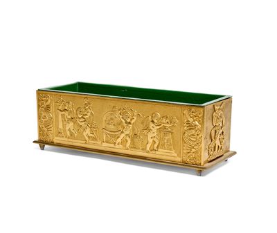 an image of a gold and green planter sitting on top of a wooden stand