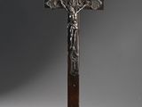 a wooden cross with a crucif on top of it