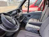 the interior of a vehicle with a steering wheel and a dashboard