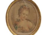 tableau représentant une femme avec une fleur dans les cheveux, dans un cadre doré