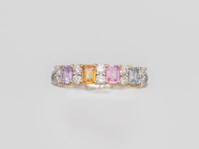 a multicolored sapphire and diamond ring