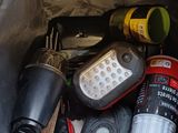a bag full of items in the back of a car