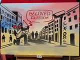 tableau représentant un homme tenant une pancarte sur laquelle on peut lire « liberté bien-aimée »