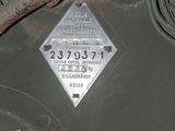 a close up of a metal sign on the side of a military vehicle