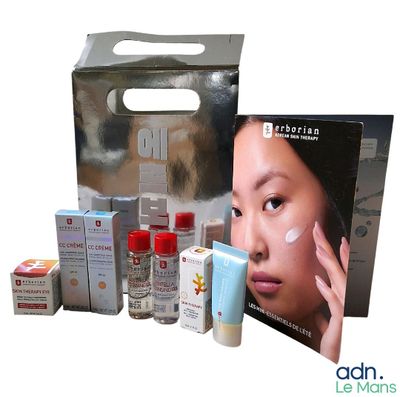 a picture of a box of skin care products with a woman ' s face