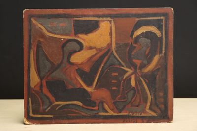 a picture of a painting on a table with a black background