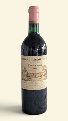 a bottle of wine that is sitting on a table
