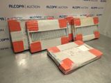 three pieces of cardboard sitting on the floor next to each other