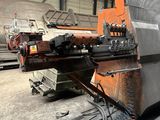 a machine that is working on a piece of metal