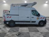 a white truck that is parked in a room