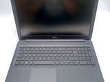 the dell laptop is open and ready to be used