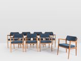 un ensemble de six chaises avec des assises rembourrées bleues