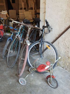 two bikes parked next to each other in a garage