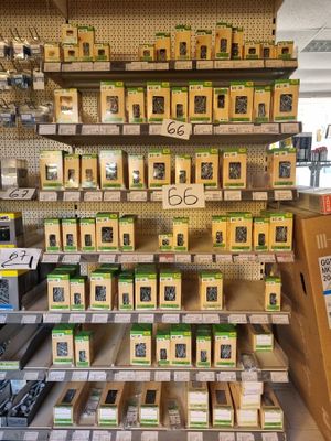 many boxes of electronics on the shelves in the store