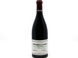 a bottle of wine that is sitting on a table