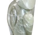 statue of an elephant on a wooden base on a white background