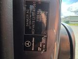 a close up of a car ' s dashboard with a sticker on it