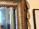 a man taking a picture of himself in a mirror