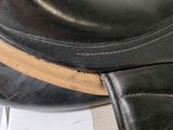 a close up of a horse ' s saddle on a box