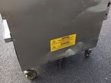 a close up of a machine that is sitting on the ground