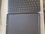 two laptops that are sitting on a table