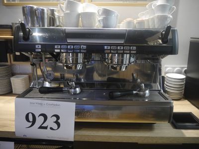 a coffee machine that is sitting on a table