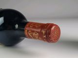 a bottle of wine that is sitting on a table