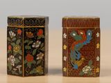 two tins that are sitting on a table