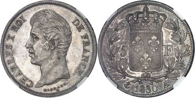 a silver coin with an image of a woman ' s head and a crown on it