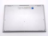 the back panel of a laptop computer with a blue sticker on it