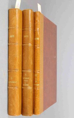 three books are stacked on top of each other on a shelf