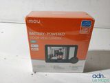 an orange box with a picture of a man on a cell phone