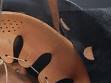 a baseball glove and a catchers mitt sitting on a table