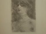 an old picture of a woman with a necklace on her neck