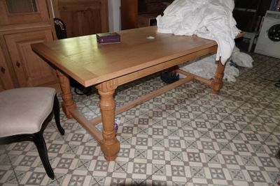 a wooden table with a book on top of it