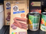 many different types of food on the shelf in the store