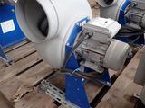 three blowers sitting on a pallet in a warehouse